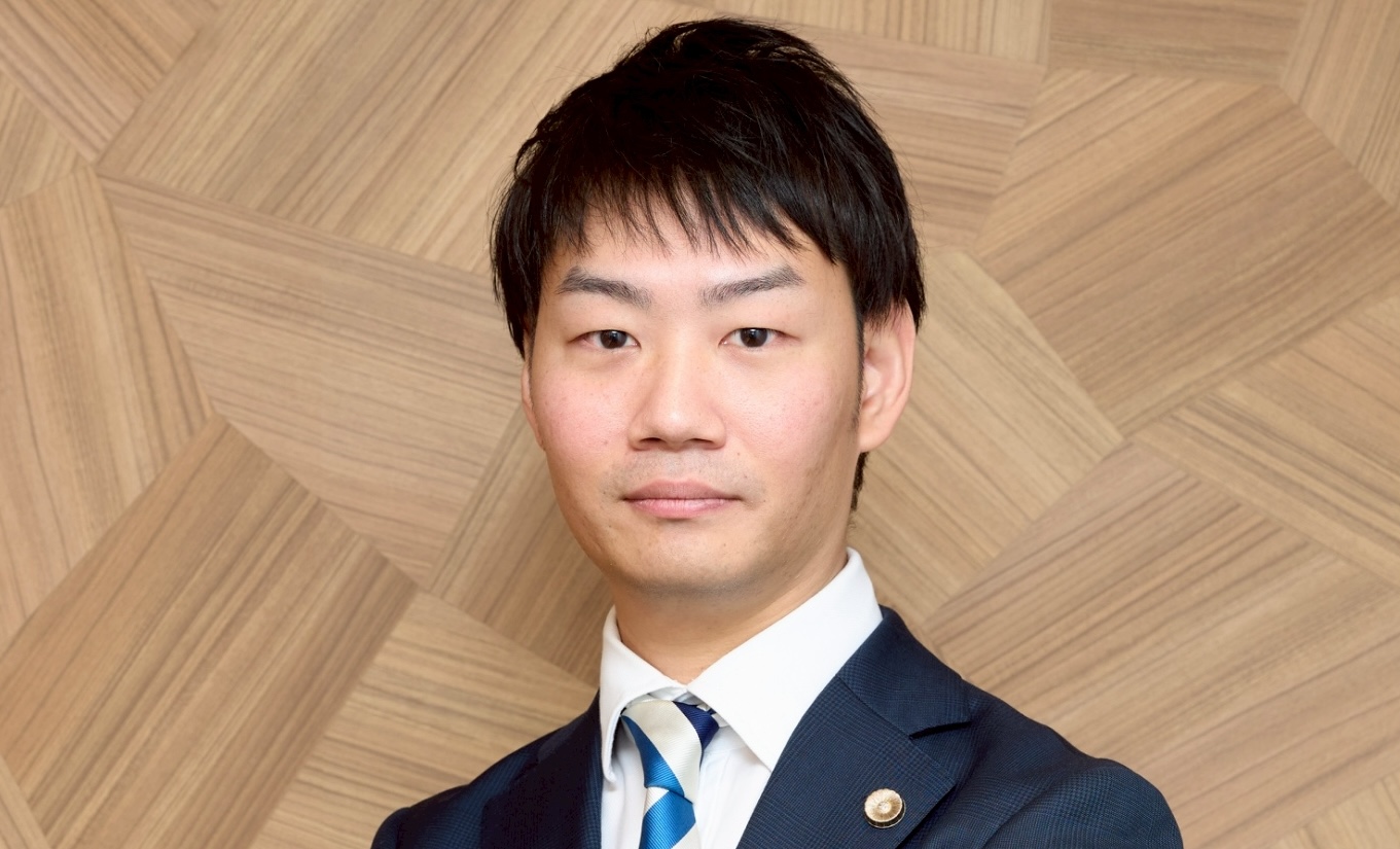 弁護士B
